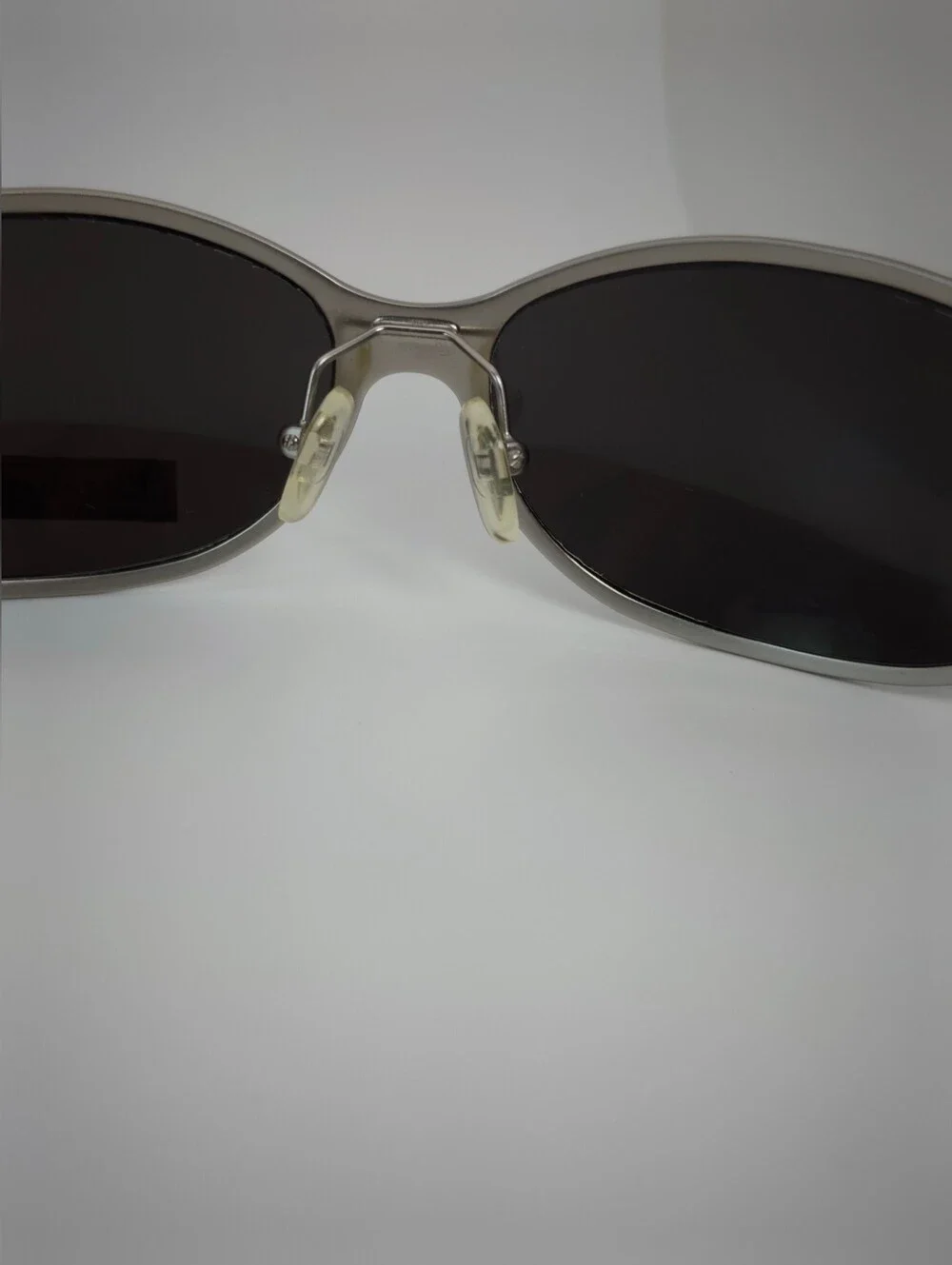 Elizabeth Arden Oval Wrap Sunglasses with Dark Lenses and Silver Frame